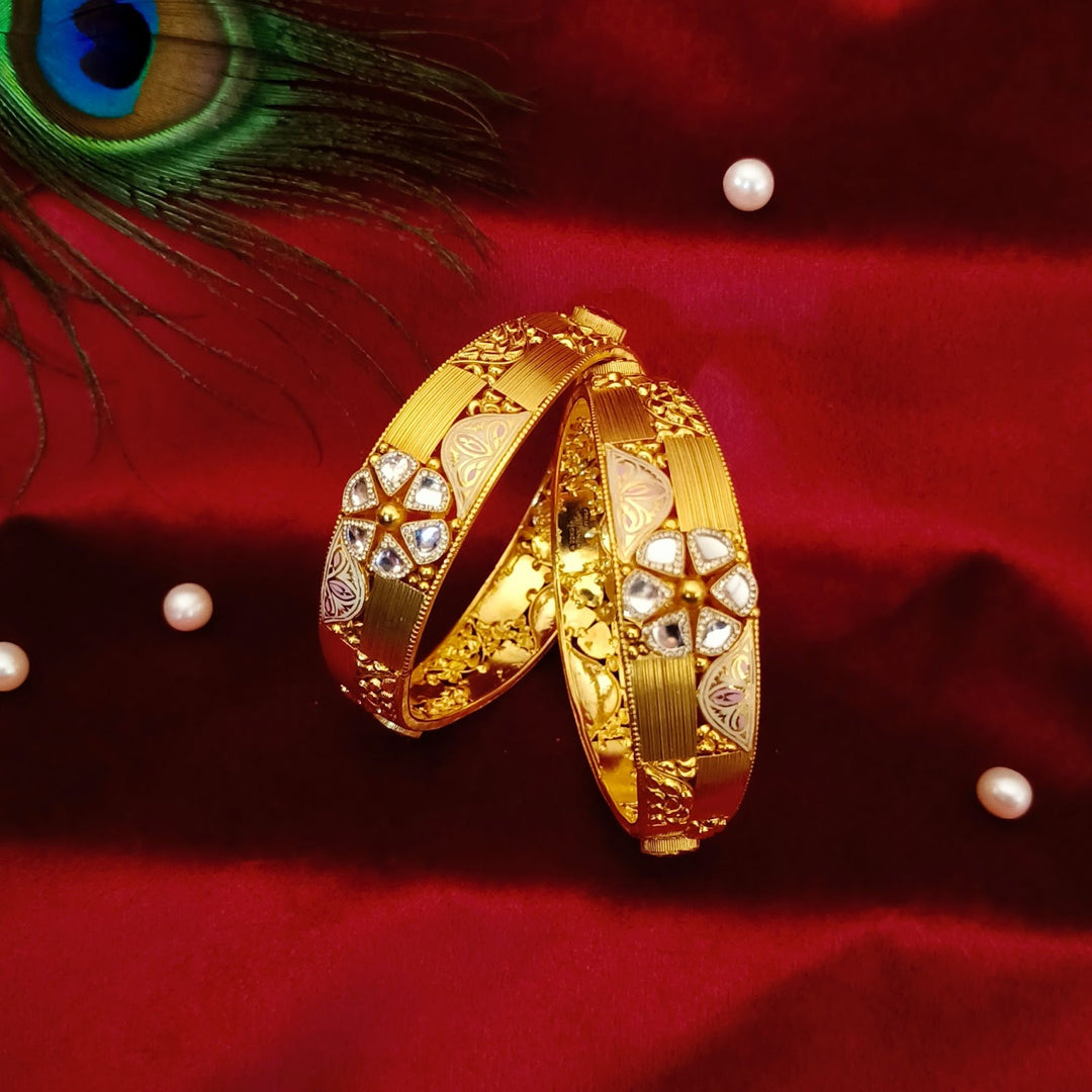 Traditional Gold Bangles with Elegant Floral Designs