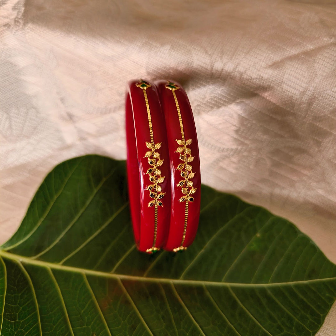 Elegant Red Chudi with Gold Floral Motif Design