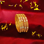Load image into Gallery viewer, Bridal 4-Piece Gold Bangle Set with Vintage Ruby colored and Diamond Touches
